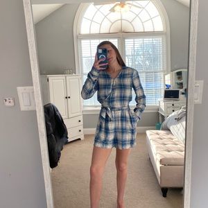 Never worn flannel pattern long sleeve romper